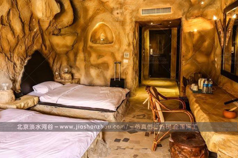 山西大同人工洞穴酒店創(chuàng)意加入壁爐設計使冬天溫暖而舒適