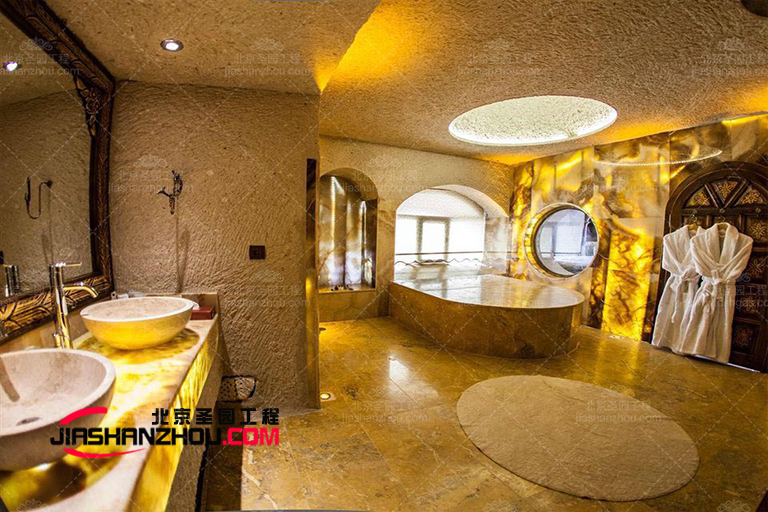 現(xiàn)代時尚的仿真洞穴主題酒店山洞浴室是如何制作的